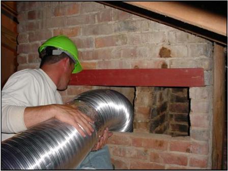 Directing ducts into chimney flues from the attic